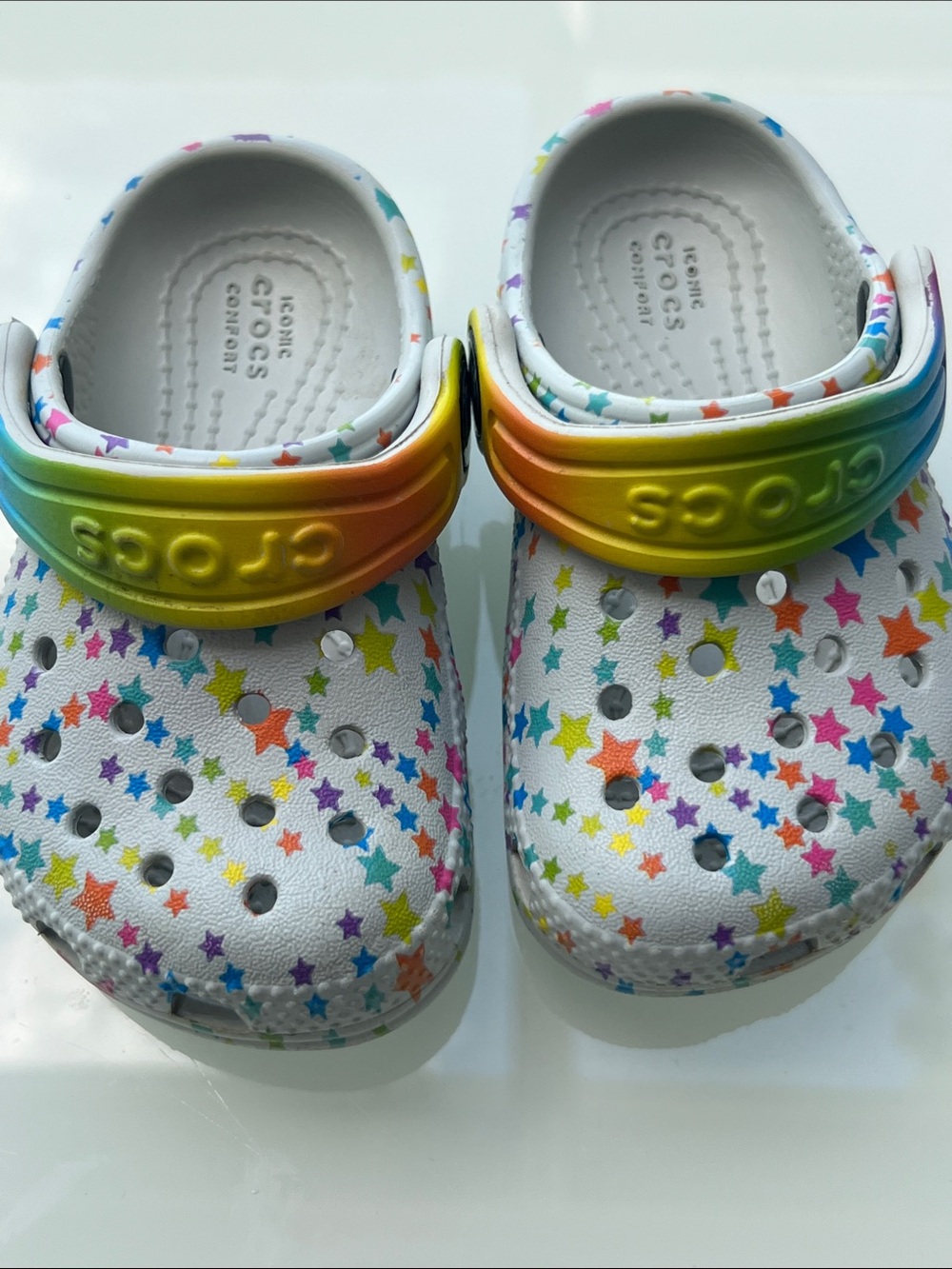 CROCS Kids White Clog with Rainbow Star Print and Rainbow Heel Strap